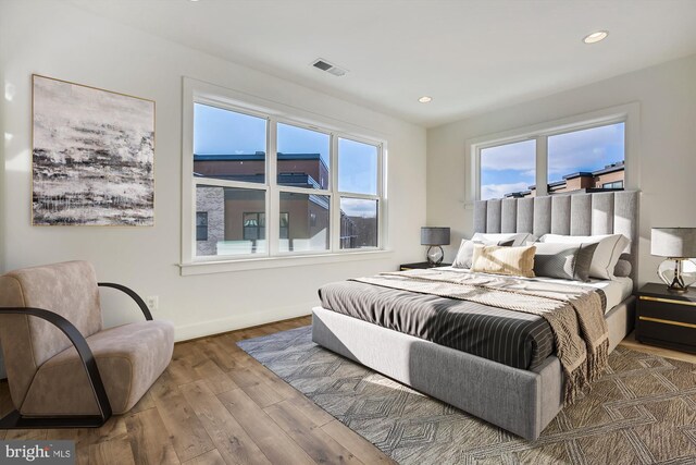 3234 Royal Fern Pl, Rockville, MD 20852 - bedroom featuring recessed lighting, baseboards, visible vents, and wood finished floors