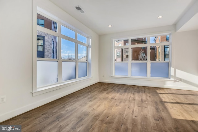 3234 Royal Fern Pl, Rockville, MD 20852 - spare room featuring wood finished floors, recessed lighting, baseboards, and visible vents