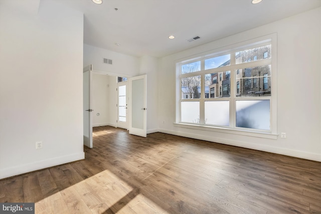 3234 Royal Fern Pl, Rockville, MD 20852 - spare room featuring wood finished floors, recessed lighting, baseboards, and visible vents