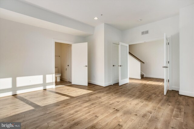 3234 Royal Fern Pl, Rockville, MD 20852 - interior space featuring stairs, light wood-type flooring, recessed lighting, baseboards, and visible vents