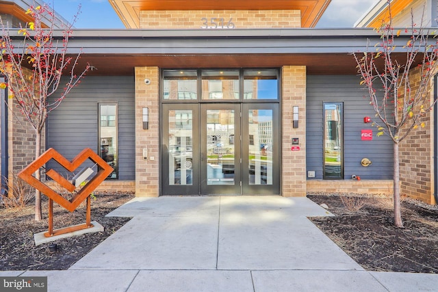 3234 Royal Fern Pl, Rockville, MD 20852 - doorway to property featuring french doors and brick siding