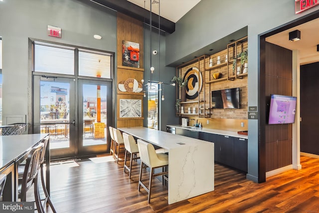 3234 Royal Fern Pl, Rockville, MD 20852 - bar with french doors, a high ceiling, and dark wood finished floors