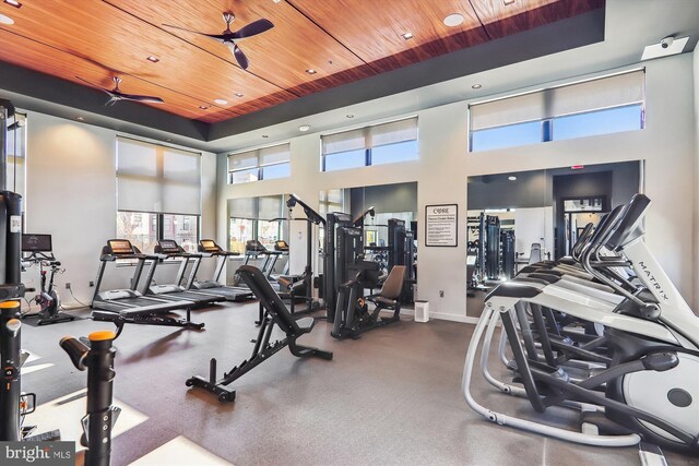 3234 Royal Fern Pl, Rockville, MD 20852 - exercise room with a tray ceiling, baseboards, wood ceiling, and recessed lighting