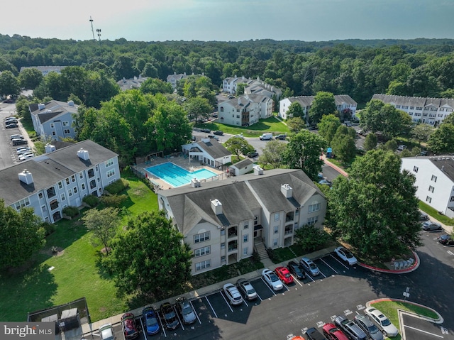 bird's eye view featuring a view of trees