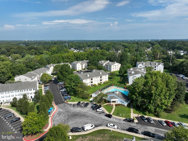 bird's eye view with a view of trees