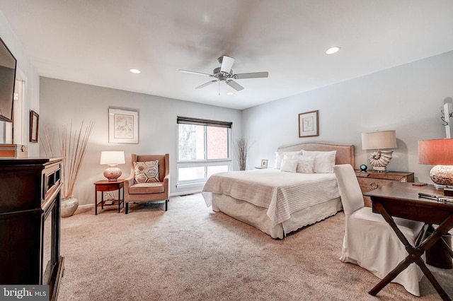 carpeted bedroom featuring ceiling fan