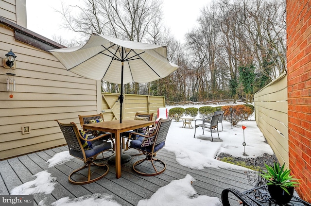 view of snow covered deck