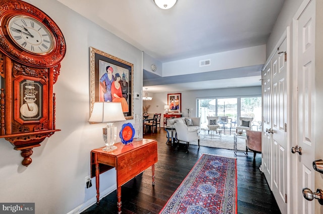 interior space with dark hardwood / wood-style floors