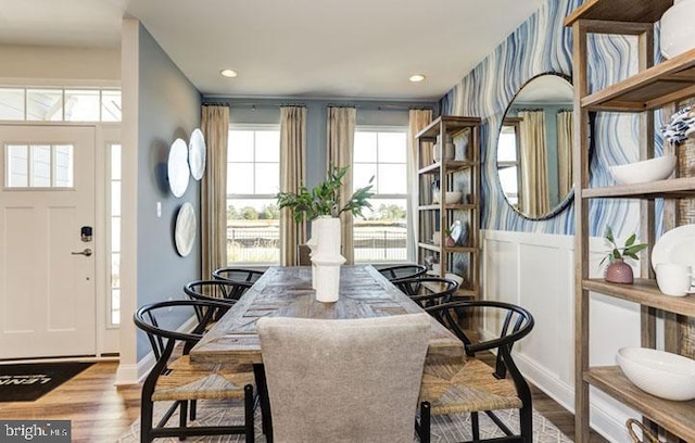 dining space featuring light wood-type flooring