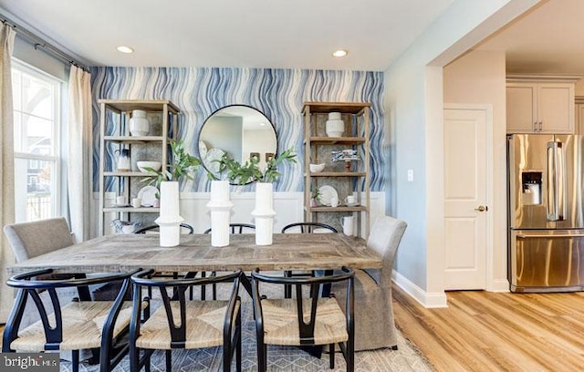 dining room with light hardwood / wood-style flooring