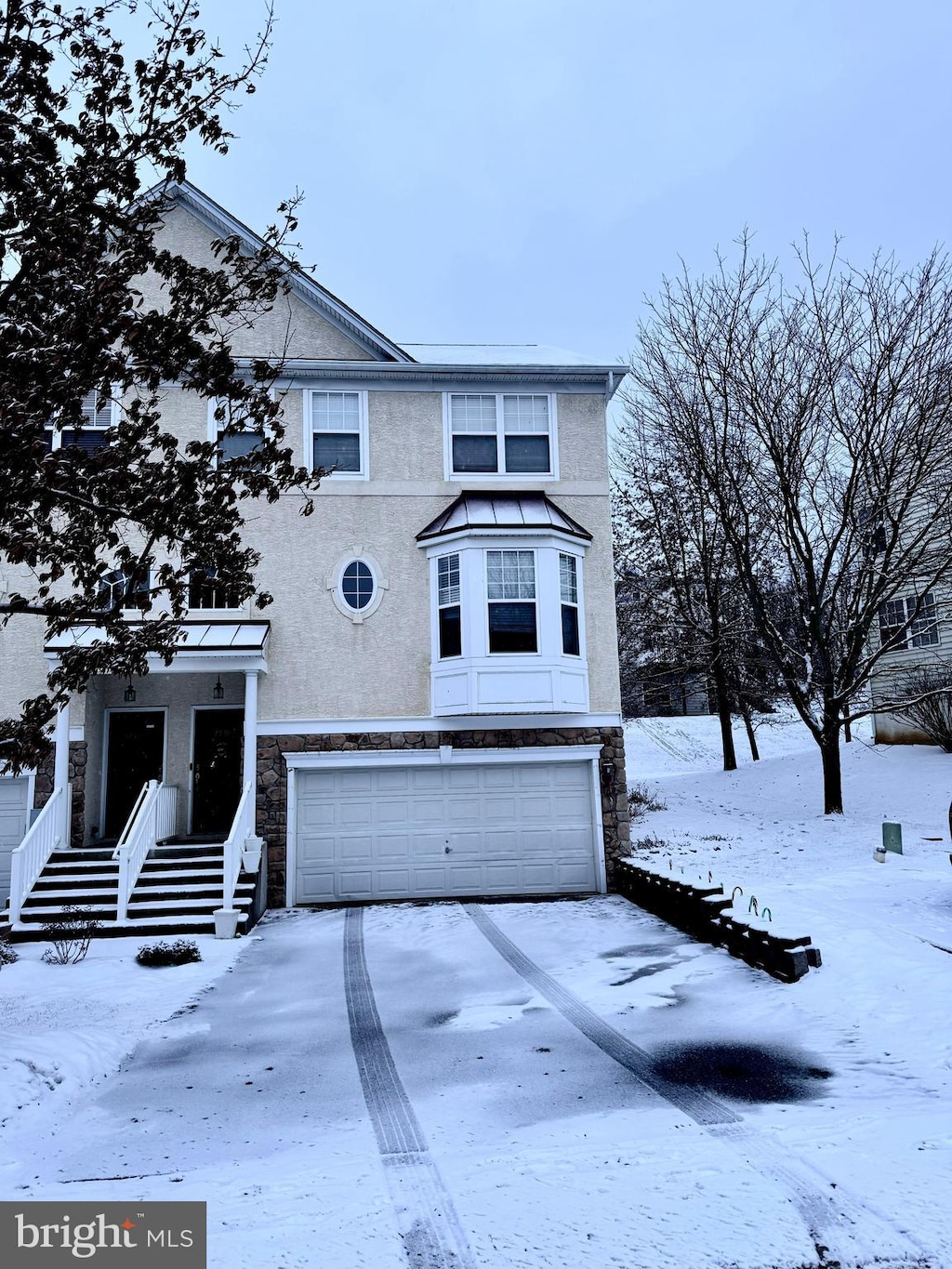 view of front of home with a garage