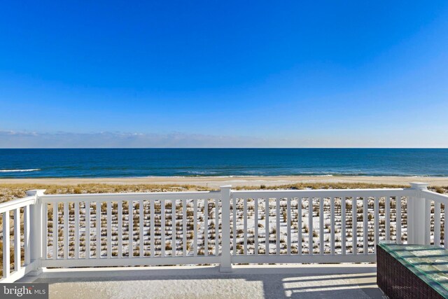 property view of water featuring a beach view