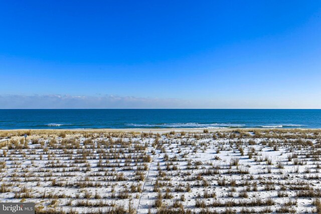 property view of water with a beach view