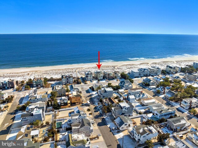 aerial view featuring a beach view and a water view