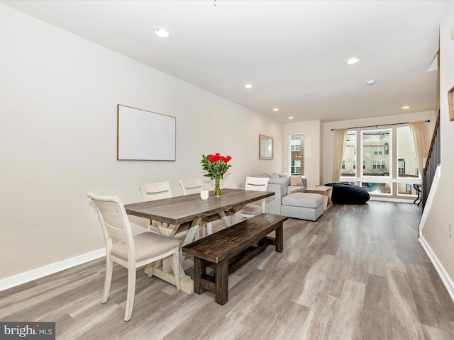 dining area with light wood-type flooring