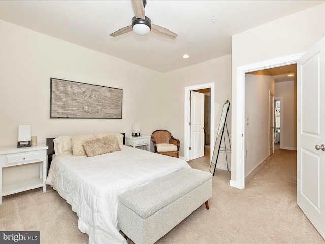 carpeted bedroom featuring ceiling fan