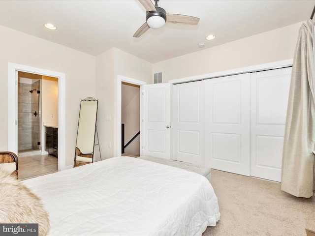 carpeted bedroom with ceiling fan