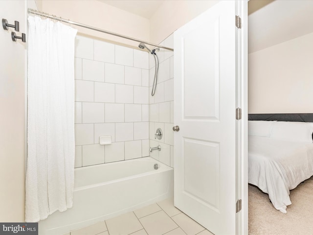 bathroom featuring tile patterned floors and shower / bath combo