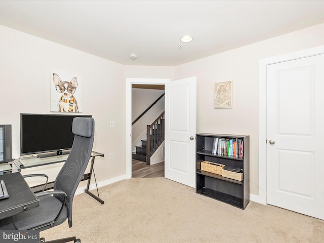 view of carpeted home office