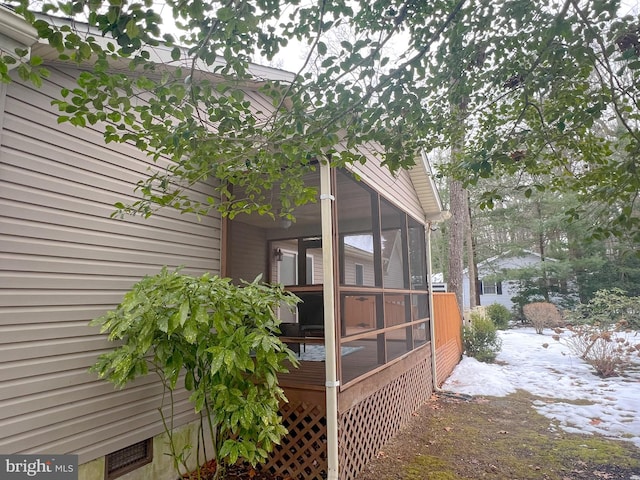 exterior space with a sunroom