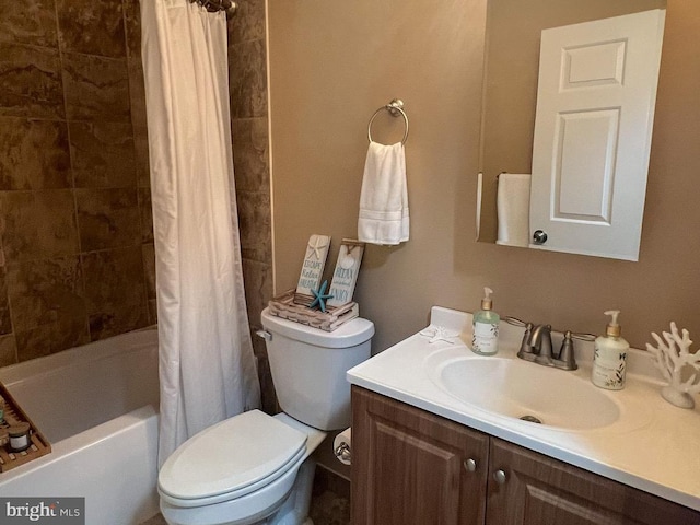 full bathroom featuring toilet, vanity, and shower / bath combo with shower curtain