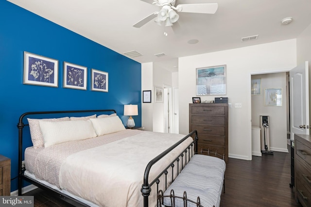 bedroom featuring ceiling fan and dark wood-type flooring