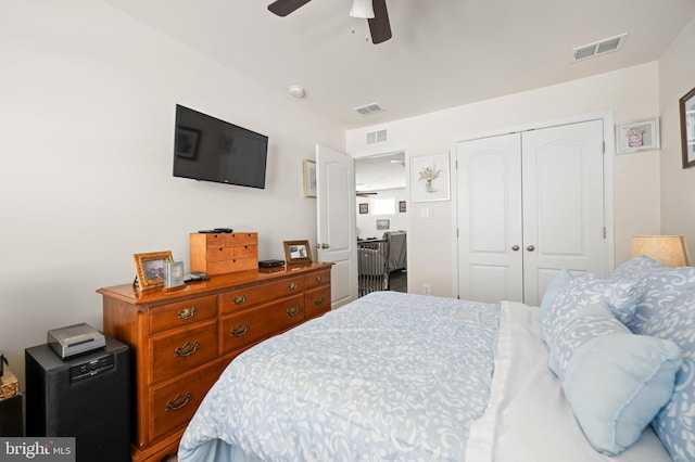 bedroom featuring ceiling fan and a closet