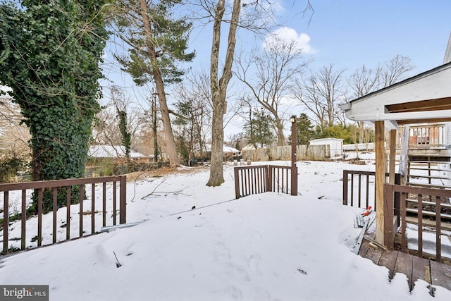 view of yard covered in snow