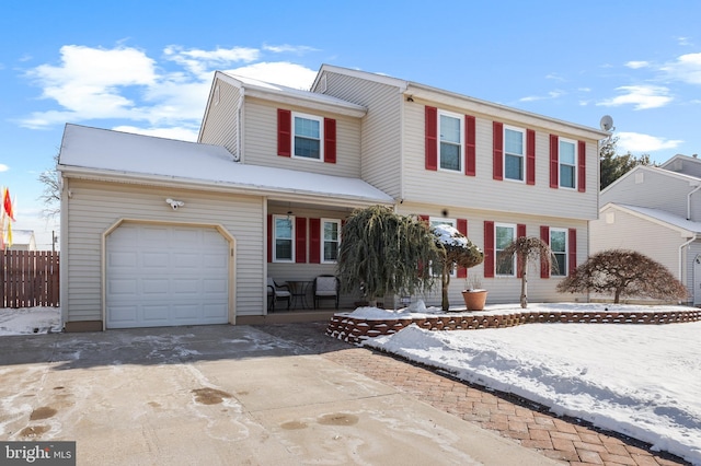 view of front of property with a garage