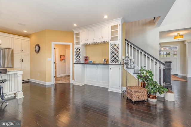 living room with dark hardwood / wood-style floors