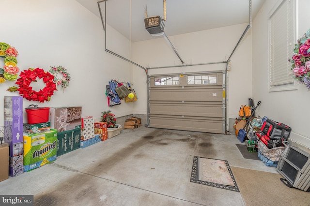 garage featuring a garage door opener