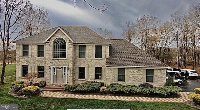 colonial house with a front yard