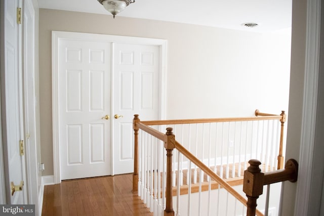 hall featuring wood-type flooring