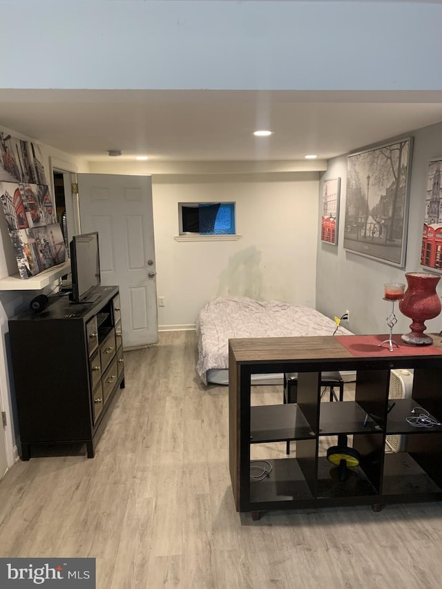 bedroom featuring light hardwood / wood-style flooring