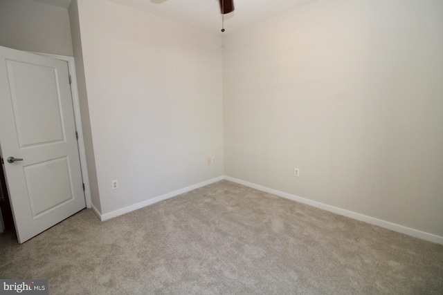 unfurnished room with light carpet and ceiling fan