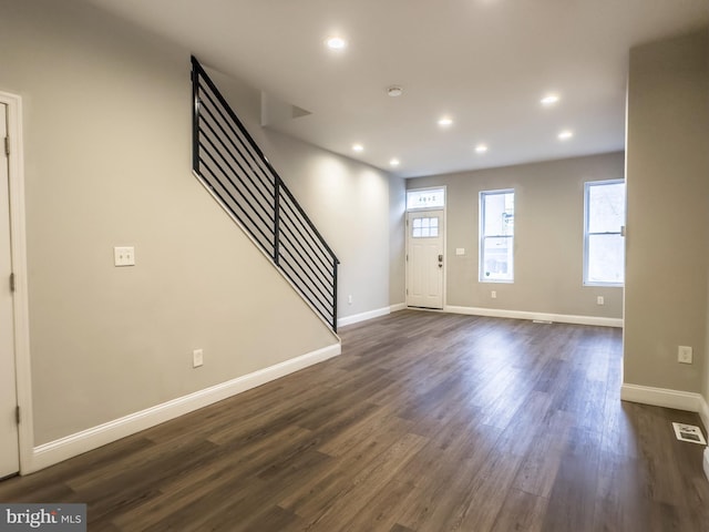 interior space featuring dark wood-type flooring