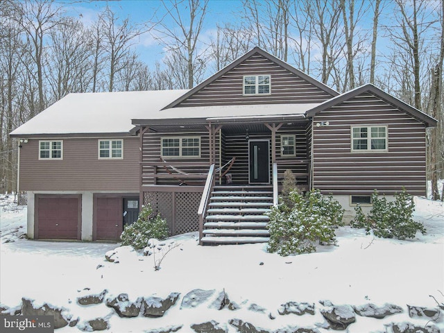 view of front of property with a garage