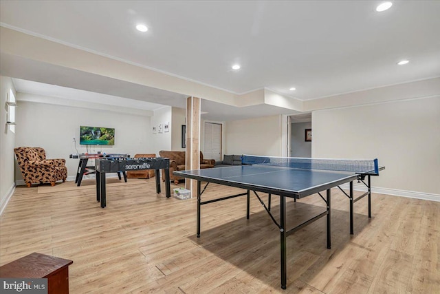 playroom featuring light wood-type flooring