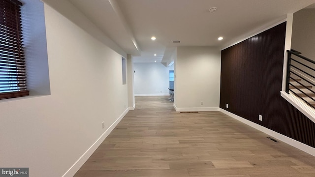 hall with light wood-type flooring