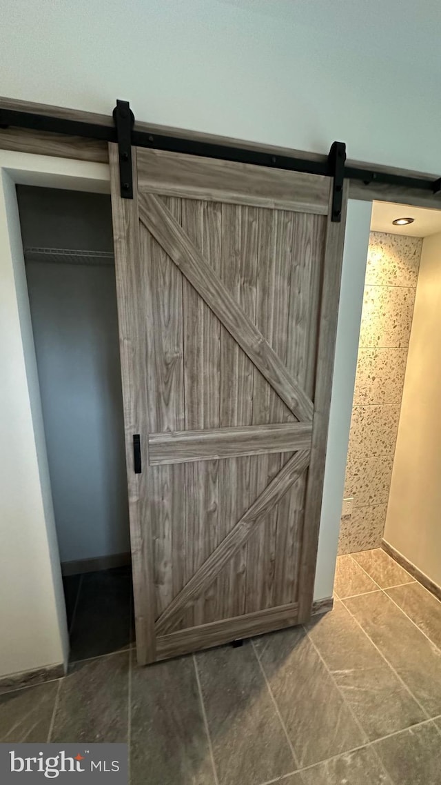 interior details with a barn door