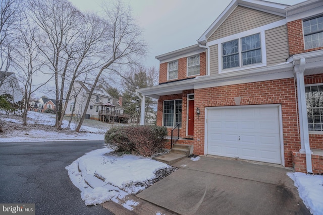 view of front of home with a garage