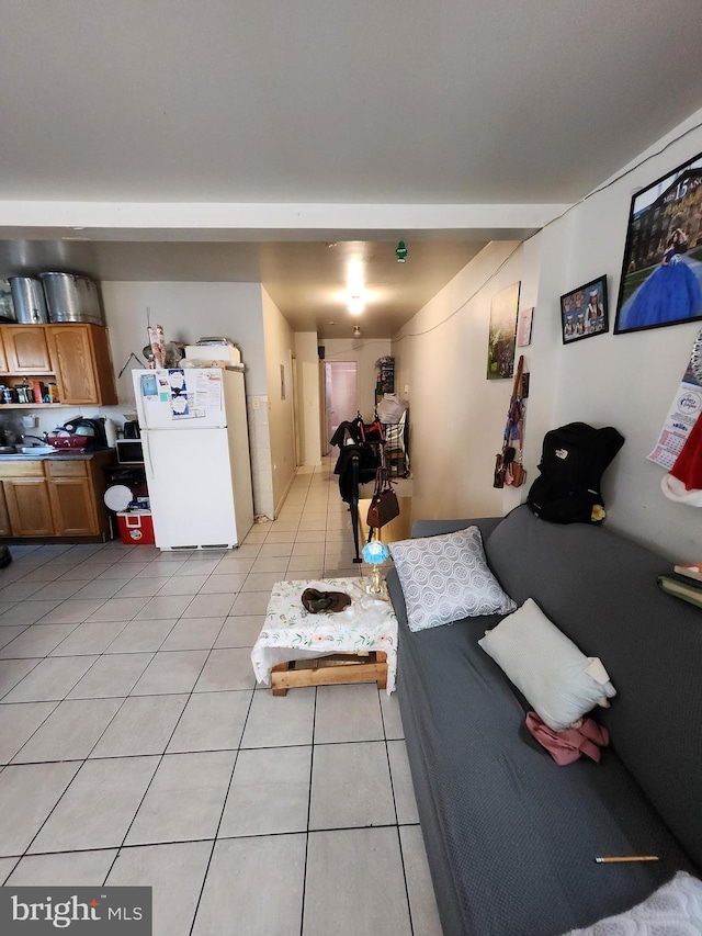 living room with light tile patterned floors