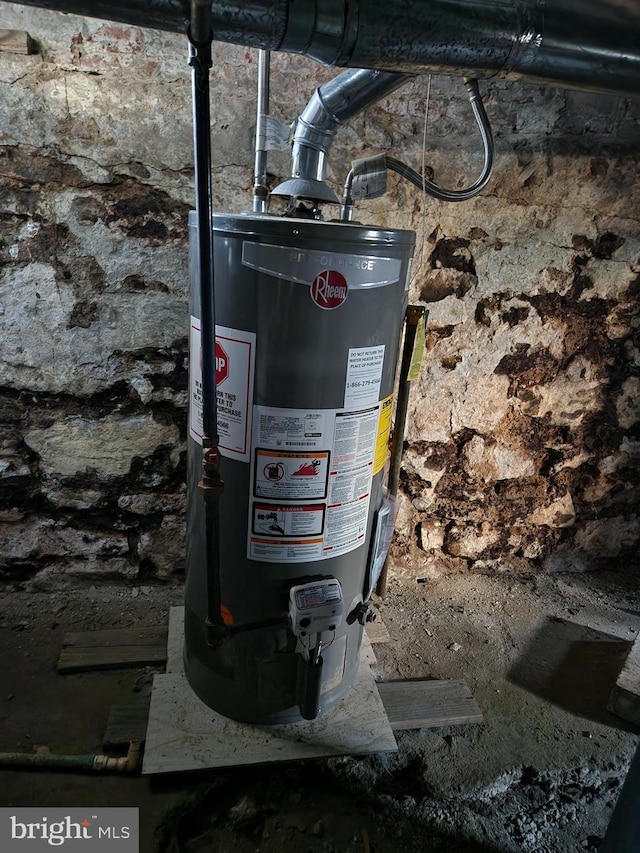 utility room with water heater