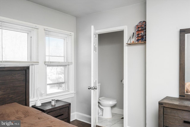 bedroom featuring ensuite bath