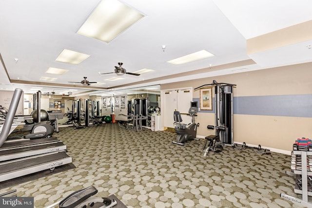 exercise room with ceiling fan