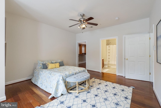 bedroom with ceiling fan, hardwood / wood-style flooring, and ensuite bath