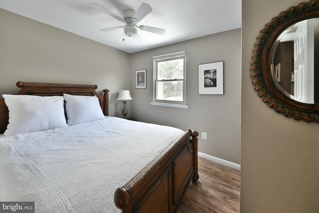 bedroom featuring dark wood-type flooring and ceiling fan