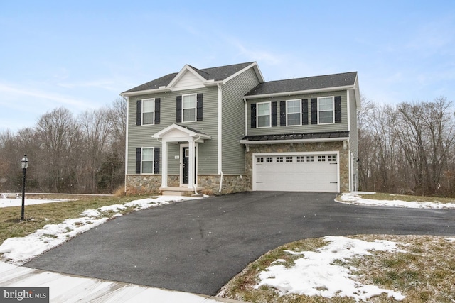 front of property with a garage