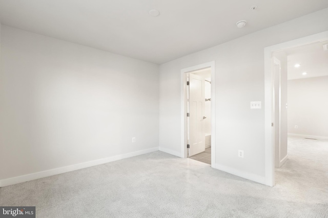 unfurnished bedroom featuring ensuite bath