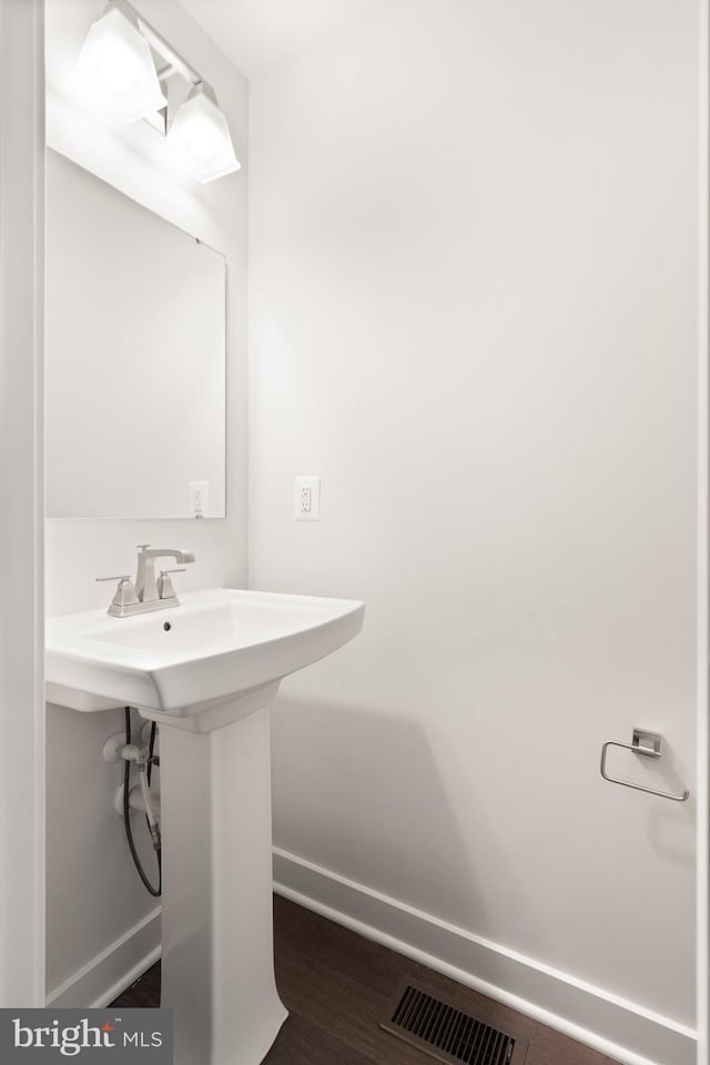 bathroom featuring hardwood / wood-style floors